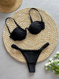 Women's black underwire bikini swimsuit with high elasticity nylon fabric on mannequin