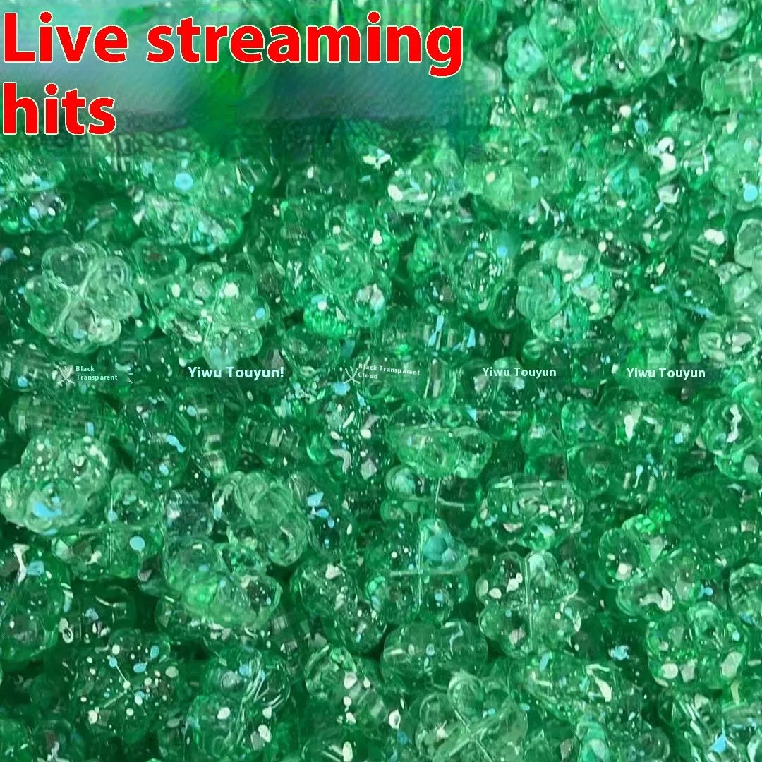 High transparency acrylic fat clover camellia beads scattered on white surface