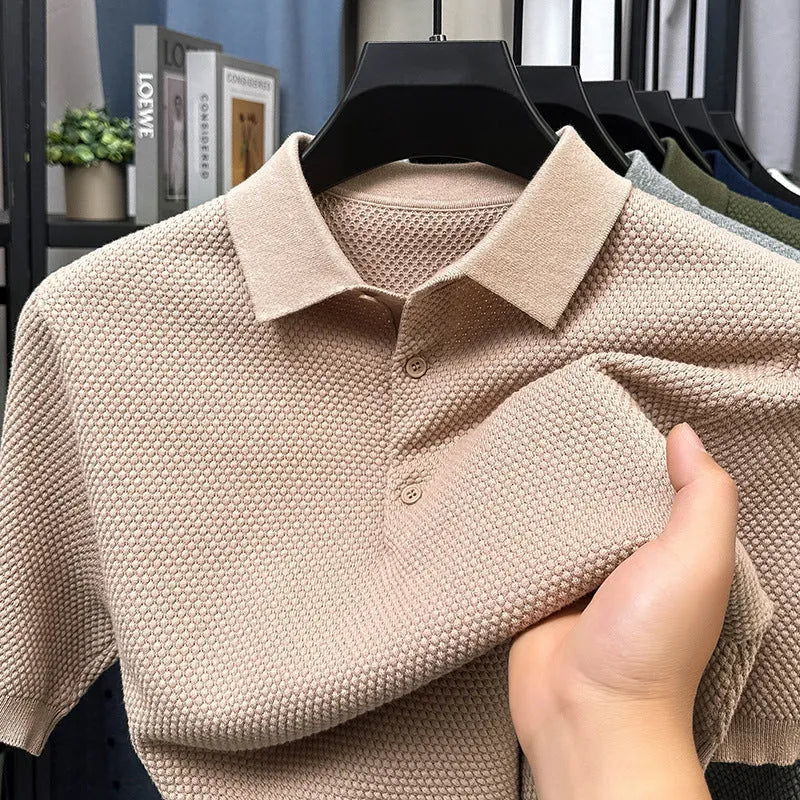 Loose fit pure cotton short sleeve pullover sweater shown in various colours including grey and navy.