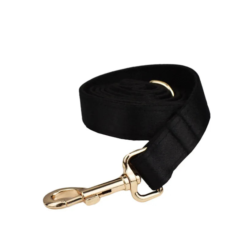 Cloth dog collar and leash set with chest strap, coordinating bow, and dog vest in multiple sizes.