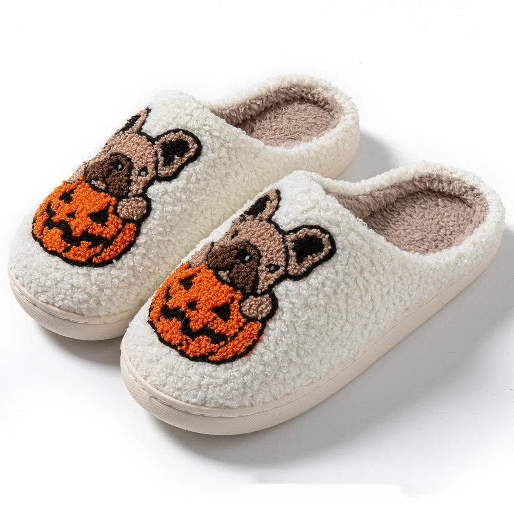 Halloween pumpkin design plush slippers with TPR rubber soles in white or black.