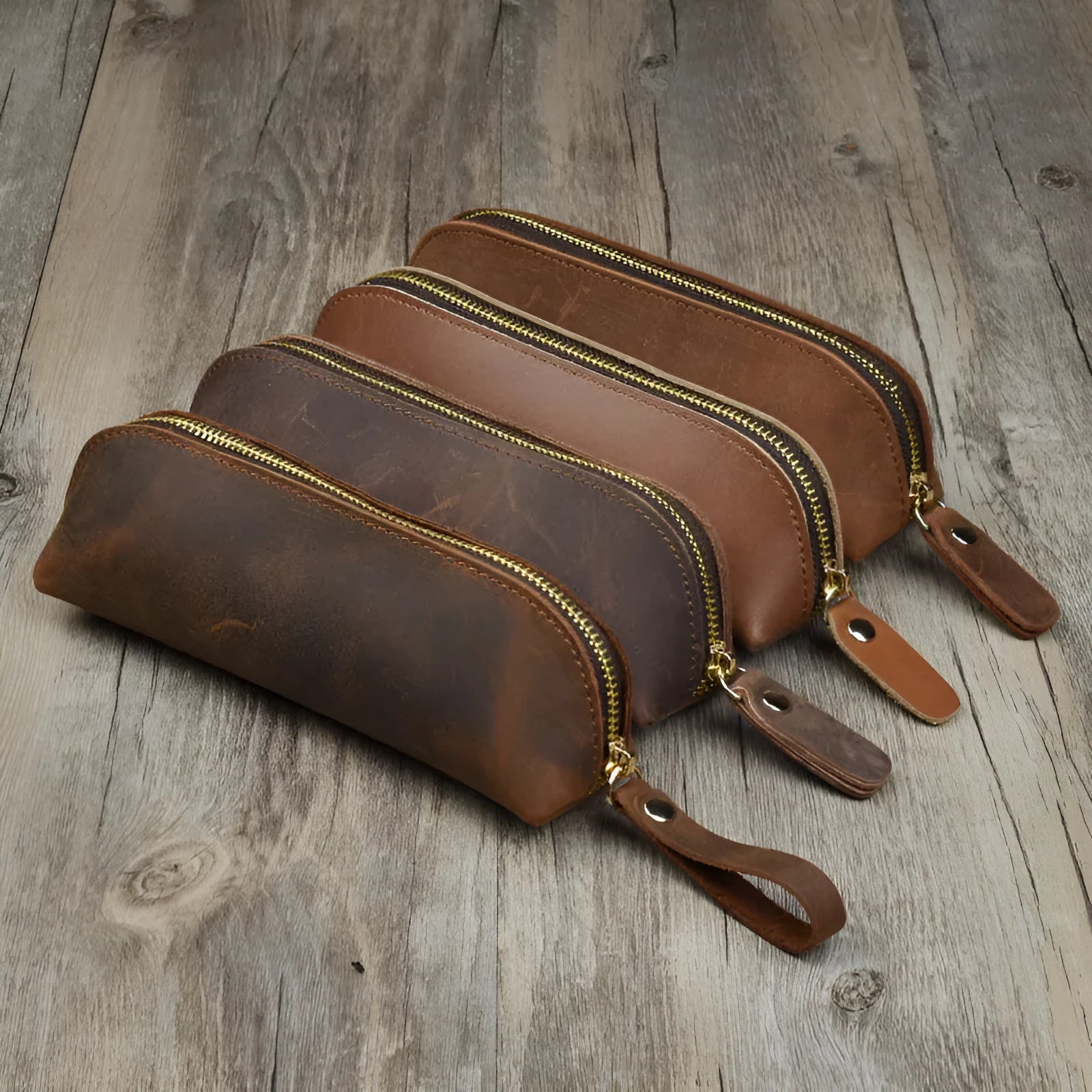 Handmade cowhide leather pencil case in rectangular shape with zipper closure