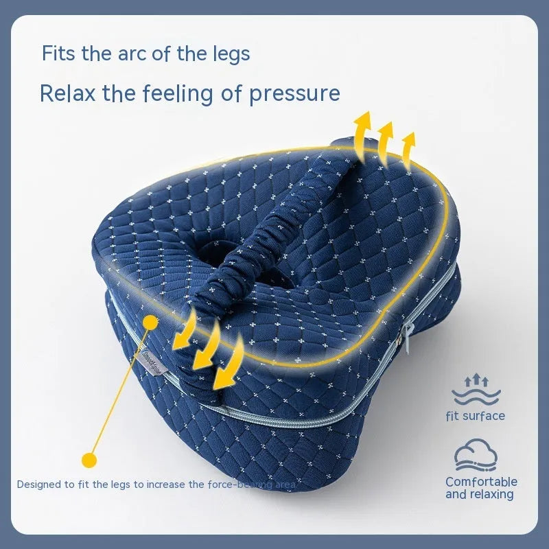Heart-shaped memory foam leg pillow in blue colour with dimensions 25x23x13cm