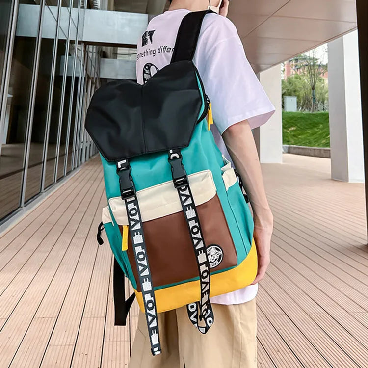 Oxford cloth backpack in black, green, or red, showing handheld and shoulder straps