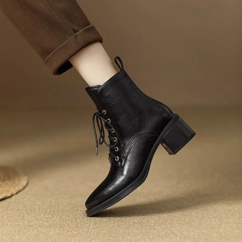 Women's black pointed toe short tube boots with 5.5cm heel and artificial PU upper