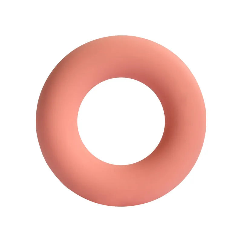 Silicone round hand grip exerciser in Coral Orange for rehabilitation and fitness training