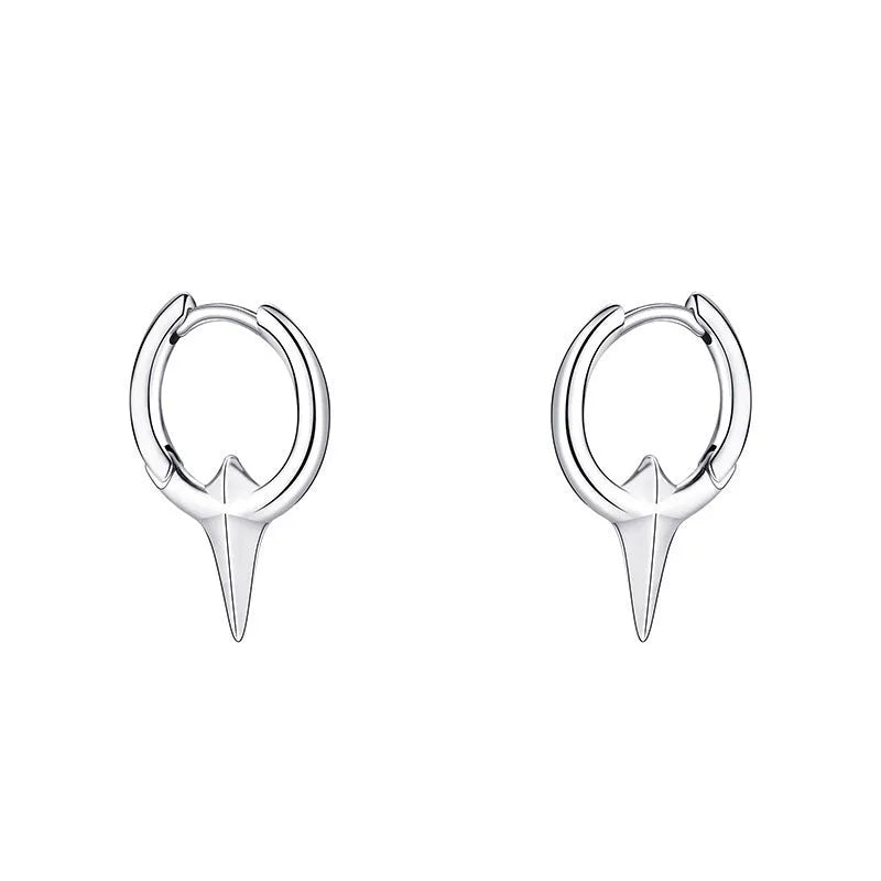 Gold electroplated copper star-shaped ear clips for women, showing geometric design.