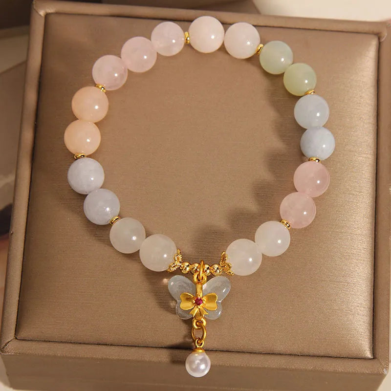 Colourful morganite bracelet with crystal butterfly pendant on silver chain