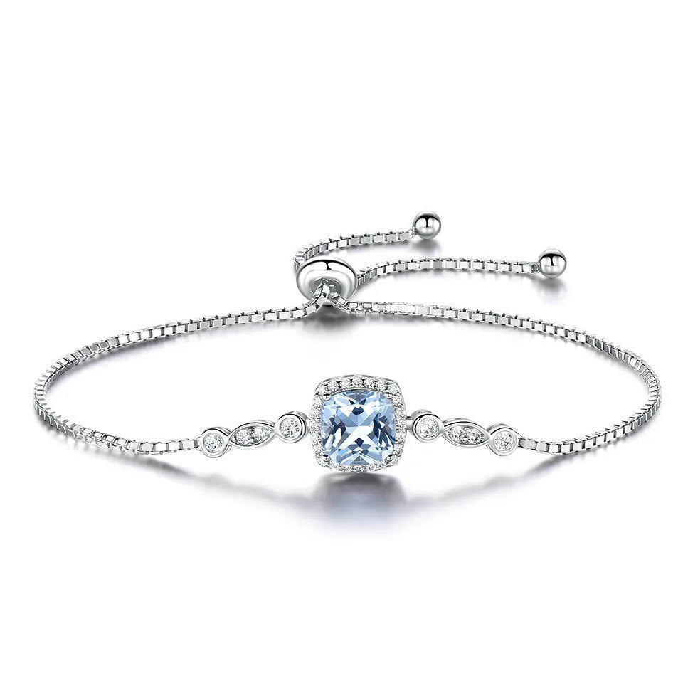 925 sterling silver jewellery set with sky blue topaz stones, including necklace, bracelet and earrings