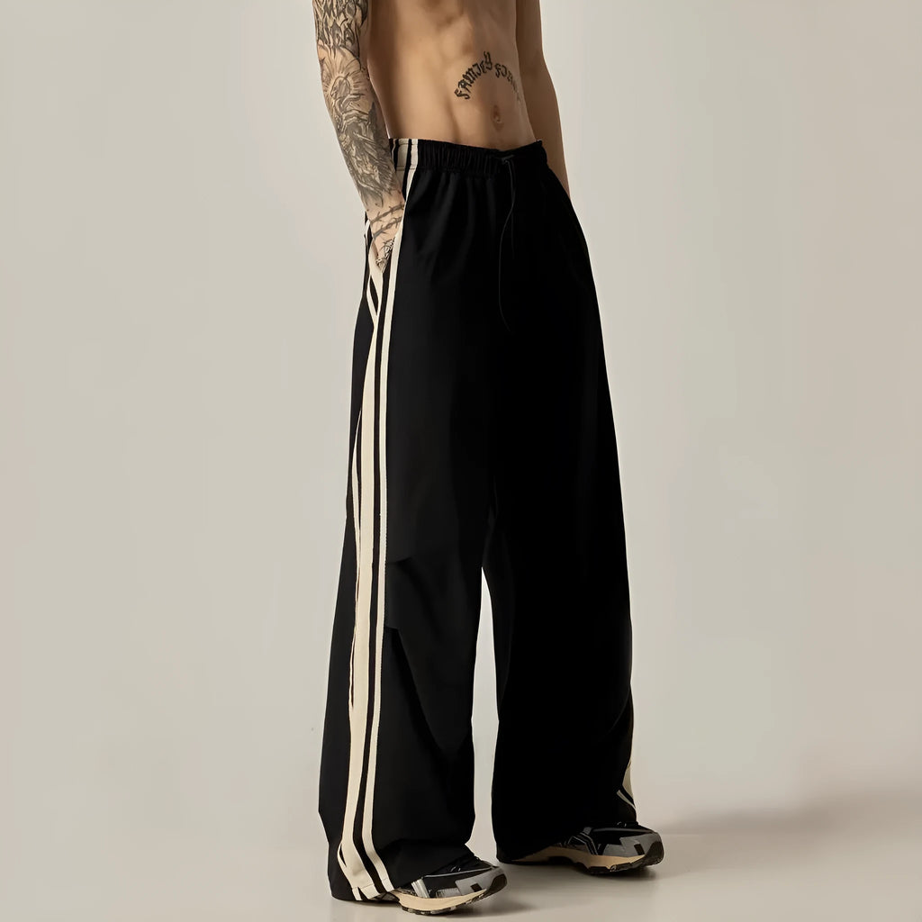 Black wide leg climbing trousers with high waist and straight-leg design