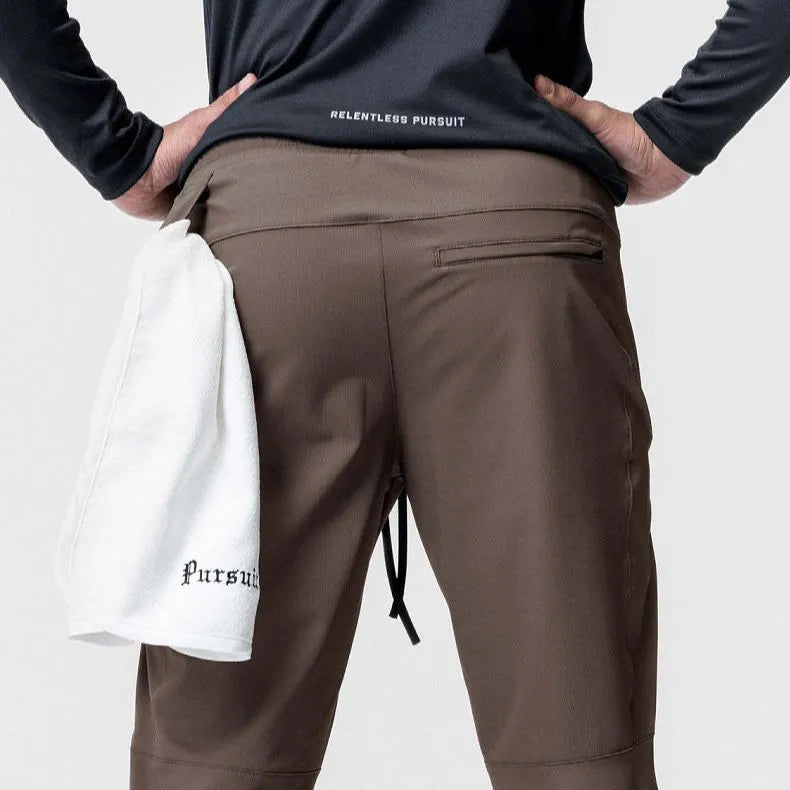 Men's grey ankle-tied running trousers for fitness exercise with quick-dry polyester fabric