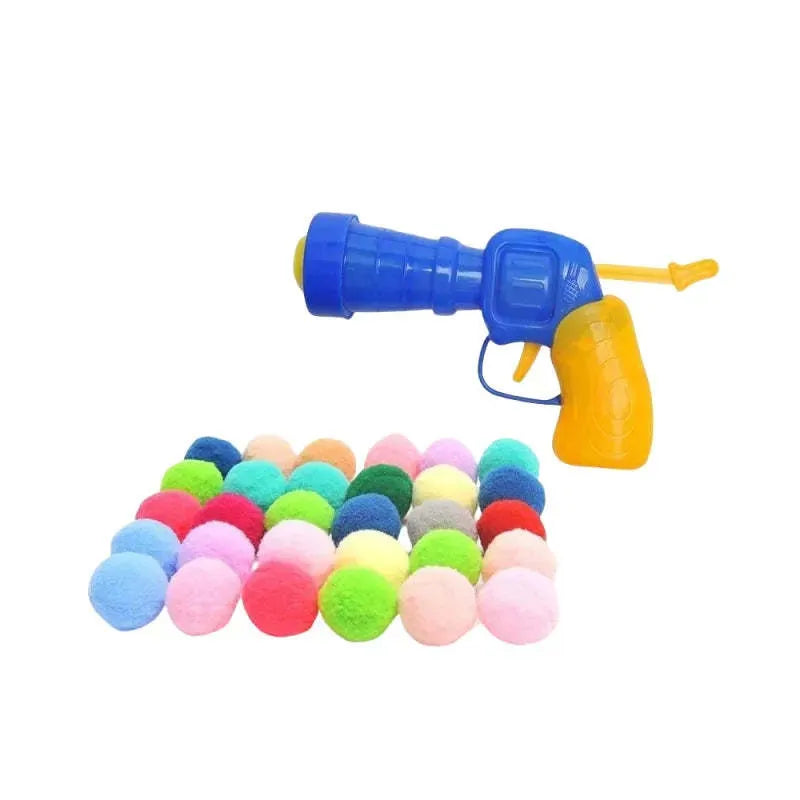 Interactive pet toy gun with plush yarn balls for dogs and cats indoor play