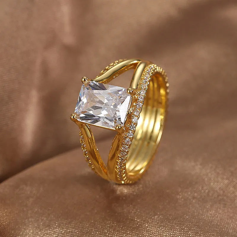 Gold square zircon geometric ring with electroplated copper band showing European American simple design