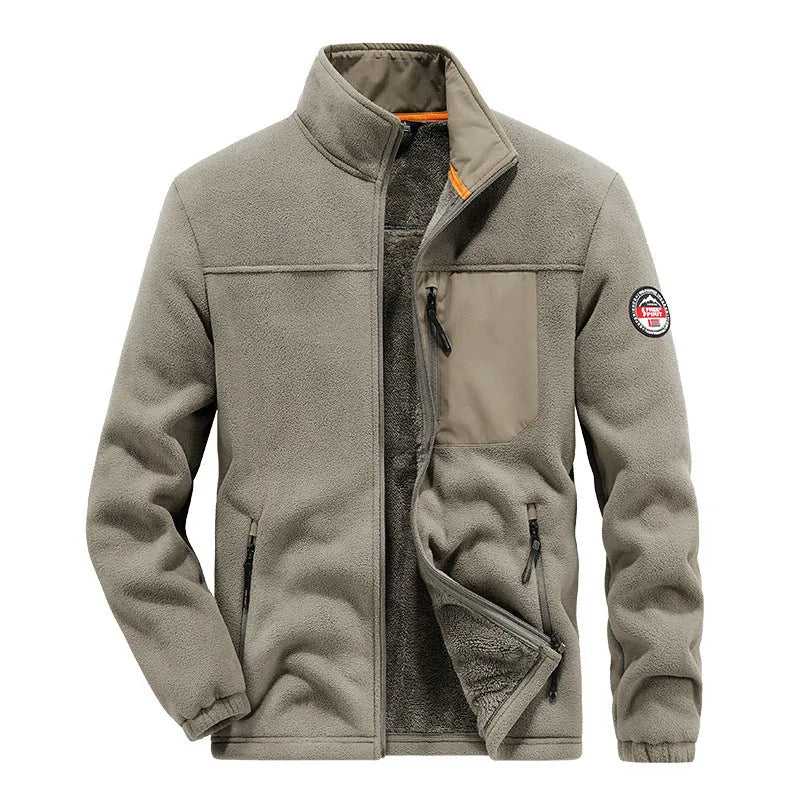 Man wearing a solid coloured thickened fleece cardigan jacket with zippered pockets
