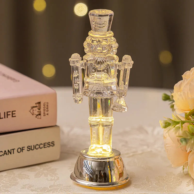 Transparent plastic walnut soldier nutcracker Christmas ornament in traditional design.