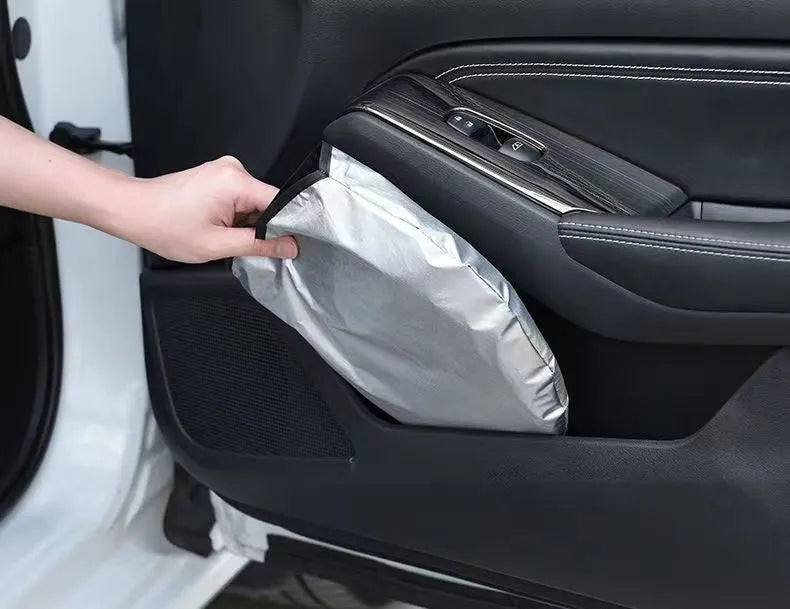 Titanium silver aluminium foil car sunshade laid flat, showing its reflective solid colour surface.