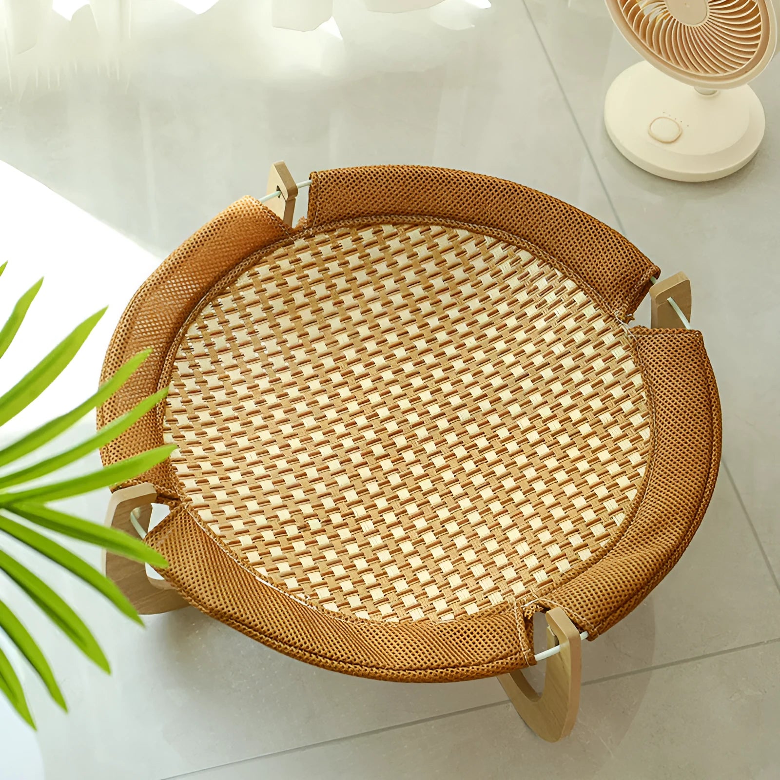 Brown woven rattan pet hammock bed measuring 46cm square with raised platform design