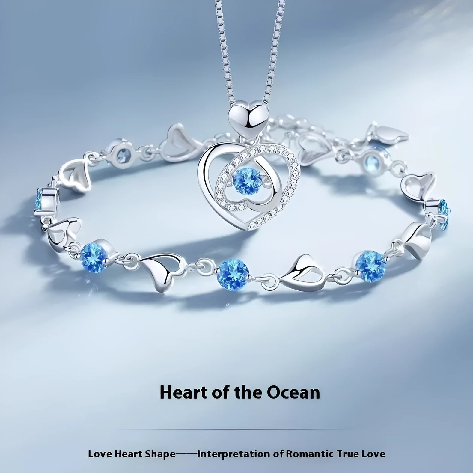 Blue heart pendant necklace and bracelet set with mixed gem inlay on geometric copper jewellery