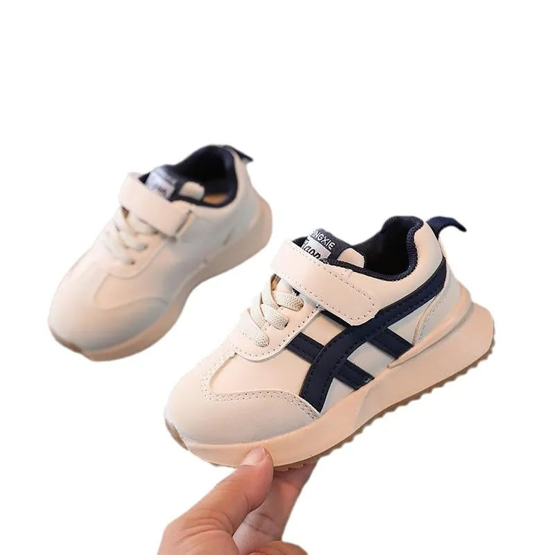 Children's white synthetic leather sneakers with Velcro strap and rubber sole