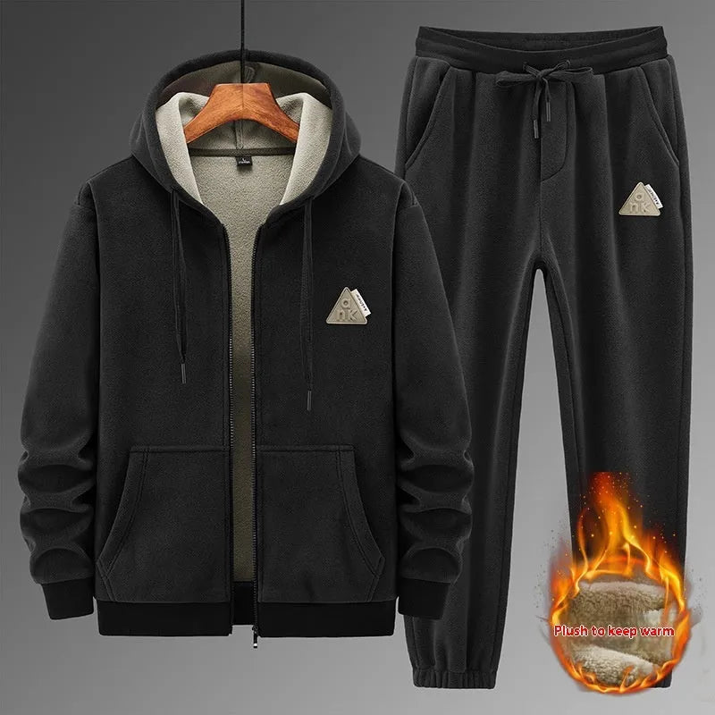 Men's grey cashmere-blend hooded sports sweater and matching trousers laid flat.