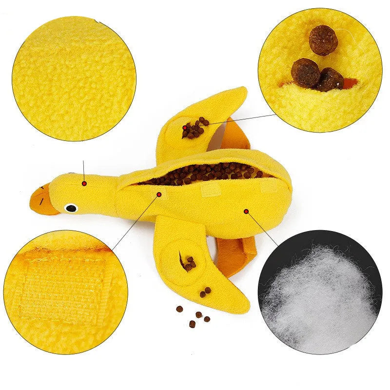 Yellow plush teddy dog toy with internal squeaky duck for training and food leak feature