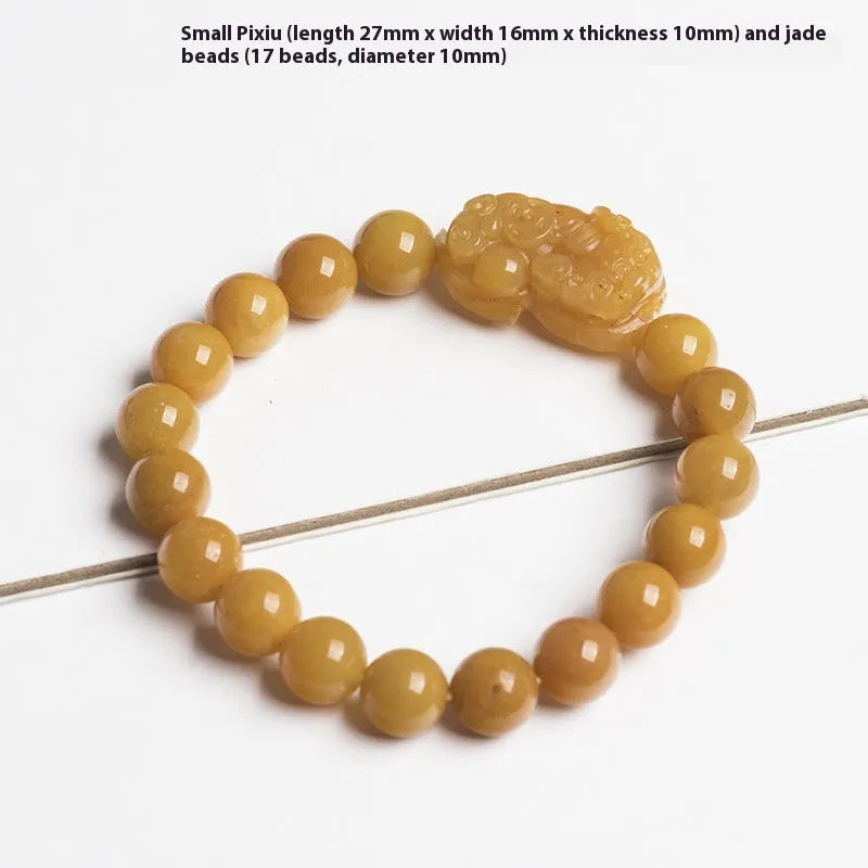 Personalised carved Golden Thread Jade bracelet showing bead detail and size comparison.