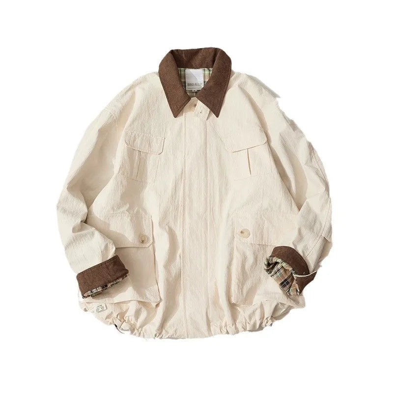 Green casual polyester jacket for men and women with side seam pockets on a hanger
