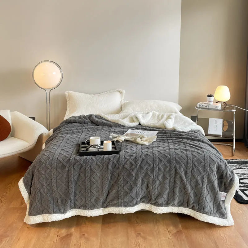 Polyester thermal flannel blanket in beige colour, shown folded to display its thick texture and modern style