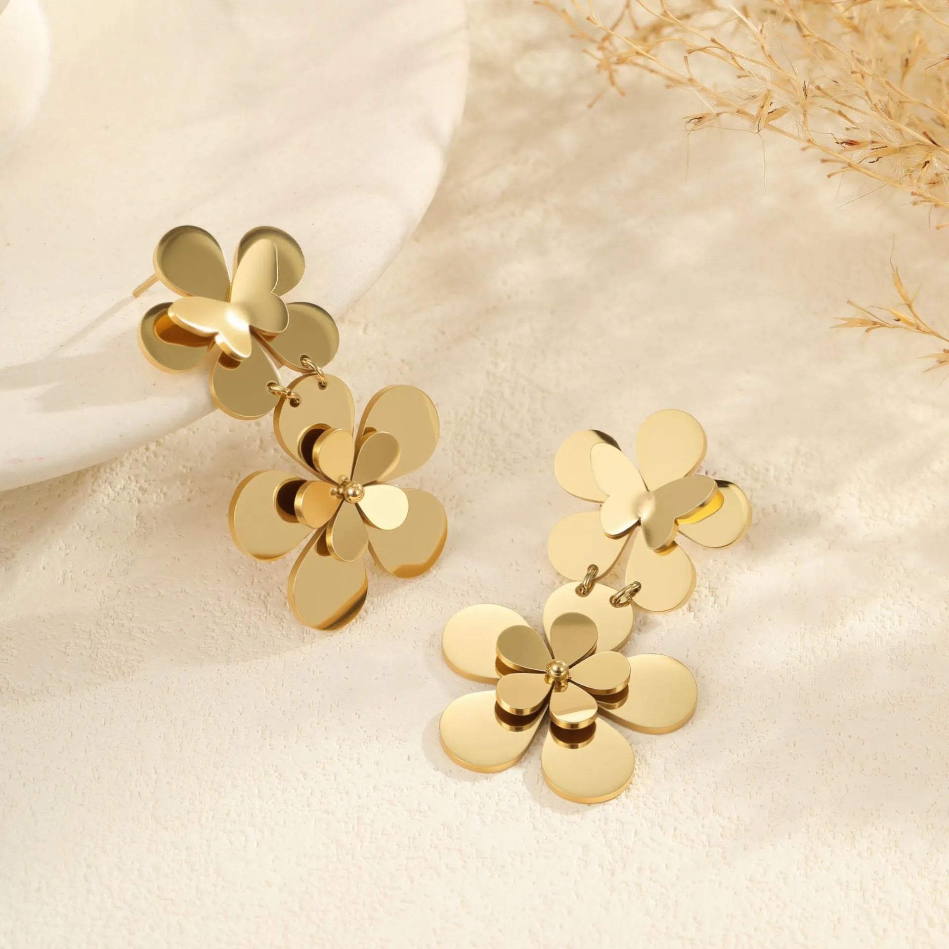 Gold floral butterfly design stainless steel earrings for women with electroplated finish