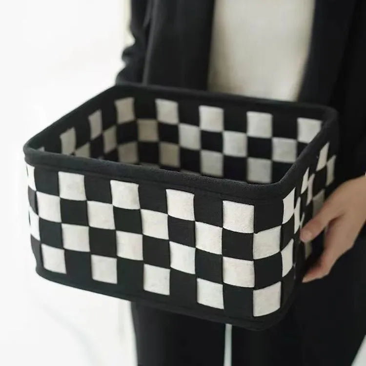 Checkerboard patterned folding felt storage basket measuring 37cm long, shown both upright and collapsed flat
