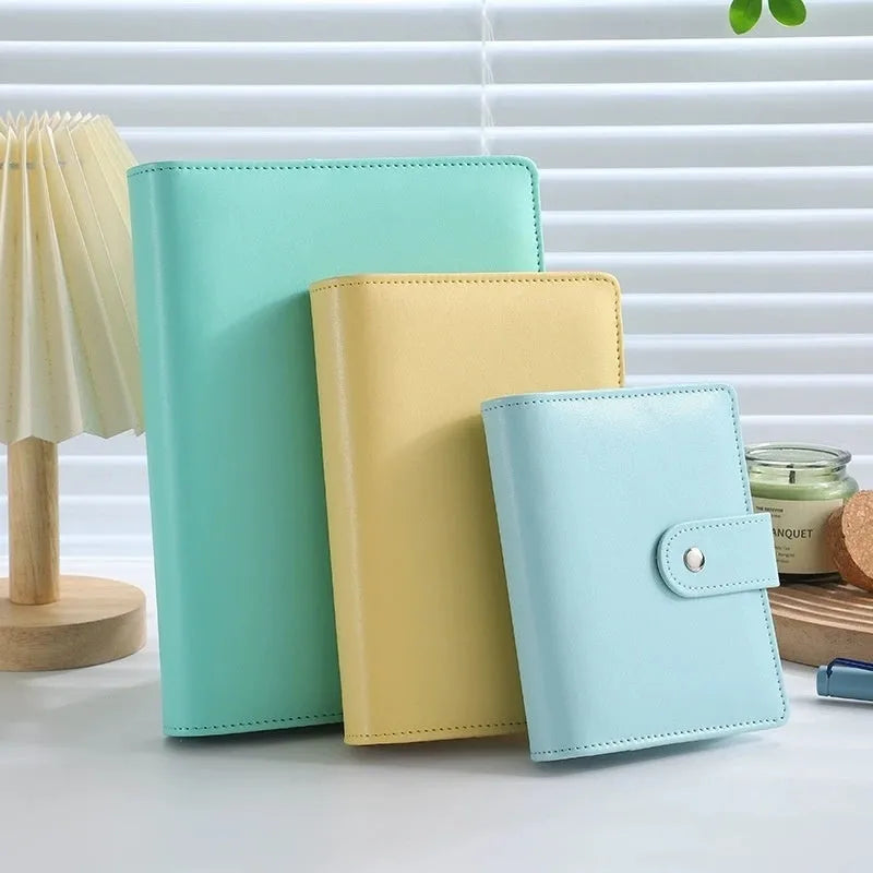 A5 PU leather loose-leaf binder shell with zipper closure shown in various colours.
