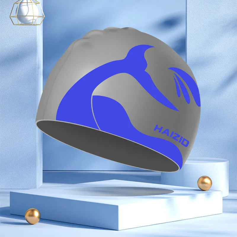 Silicone swimming cap with whale tail pattern and waterproof ear protectors in multiple colour options