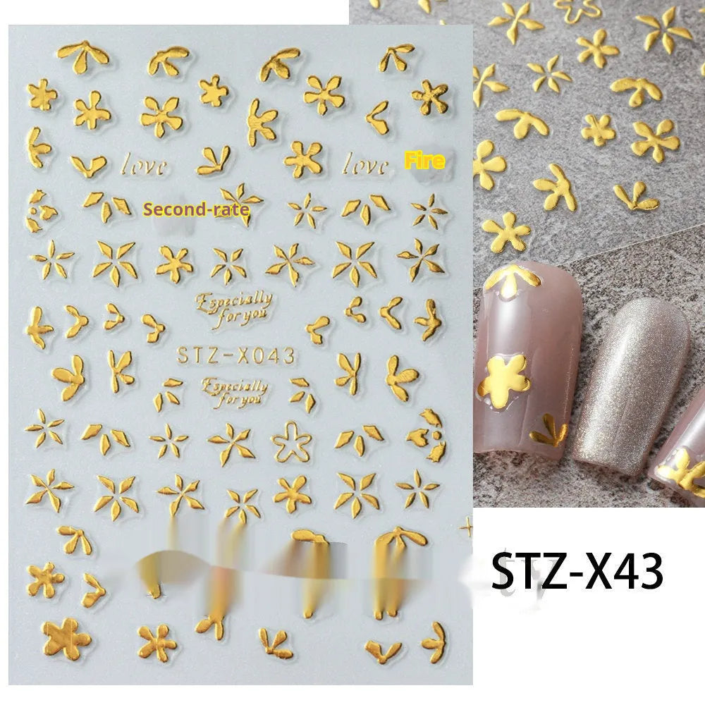 Pack of black and silver strip nail art stickers with cartoon and love pattern designs.