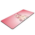 Pink cloth keyboard mat with Darling in the Franxx anime print on a desk
