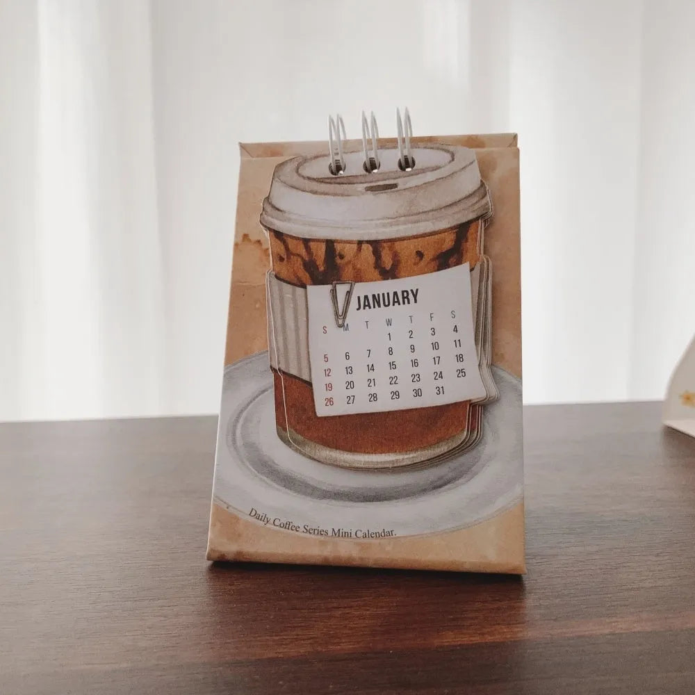 Mini 2025 desk calendar showing four design options including coffee time and motivational phrases