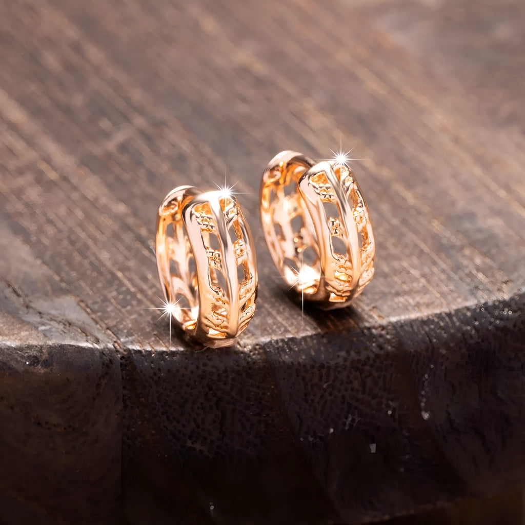 Rose gold tone hollowed out copper earrings with combined heart and leaf shapes