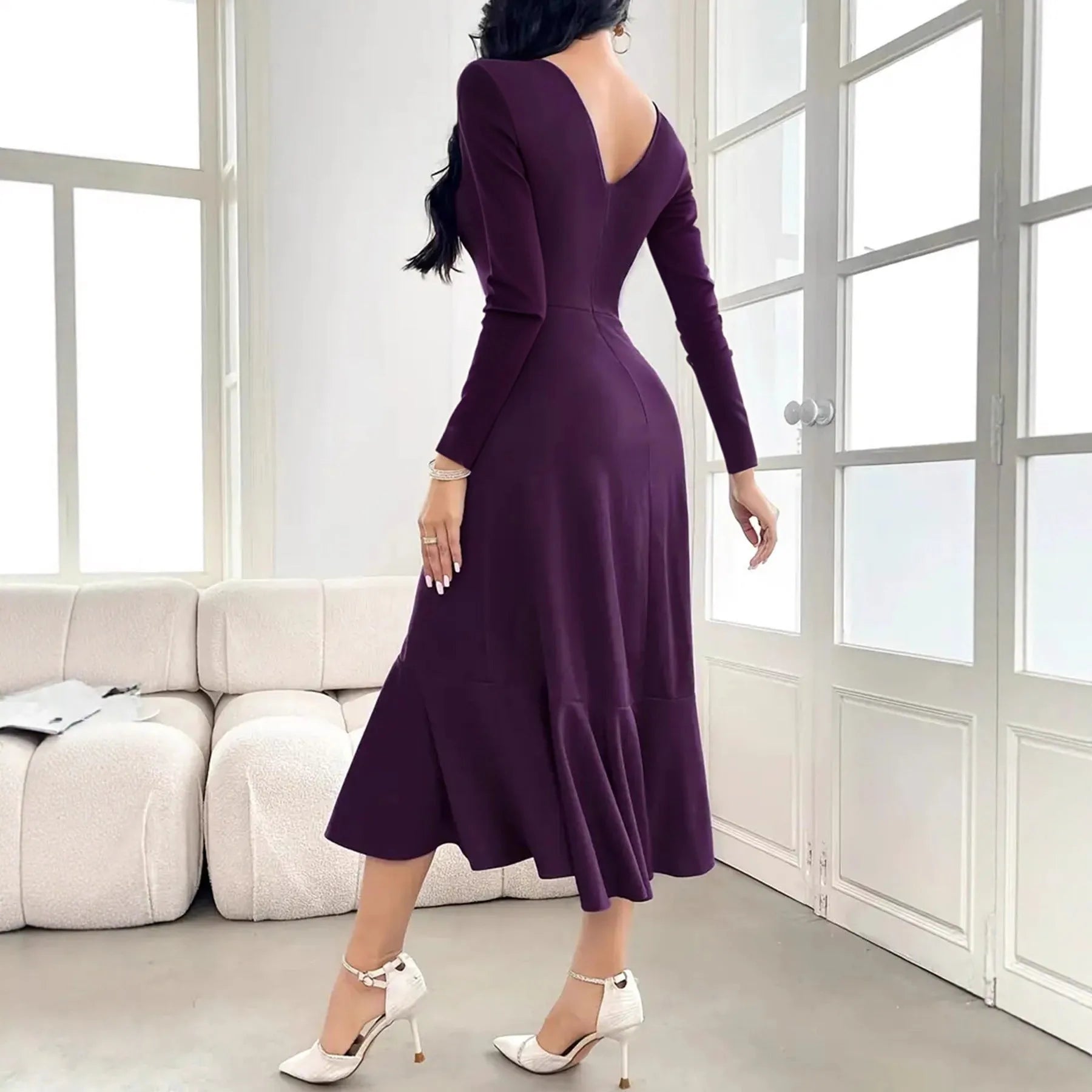 Purple women's long sleeve dress with round neck, mid waist, and ruffle trim.