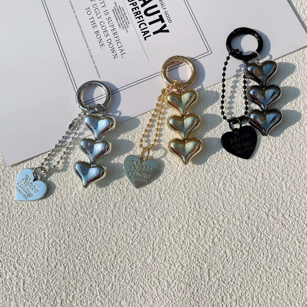 Fart Peach Love electroplated acrylic key ring with heart pattern in black, gold or white