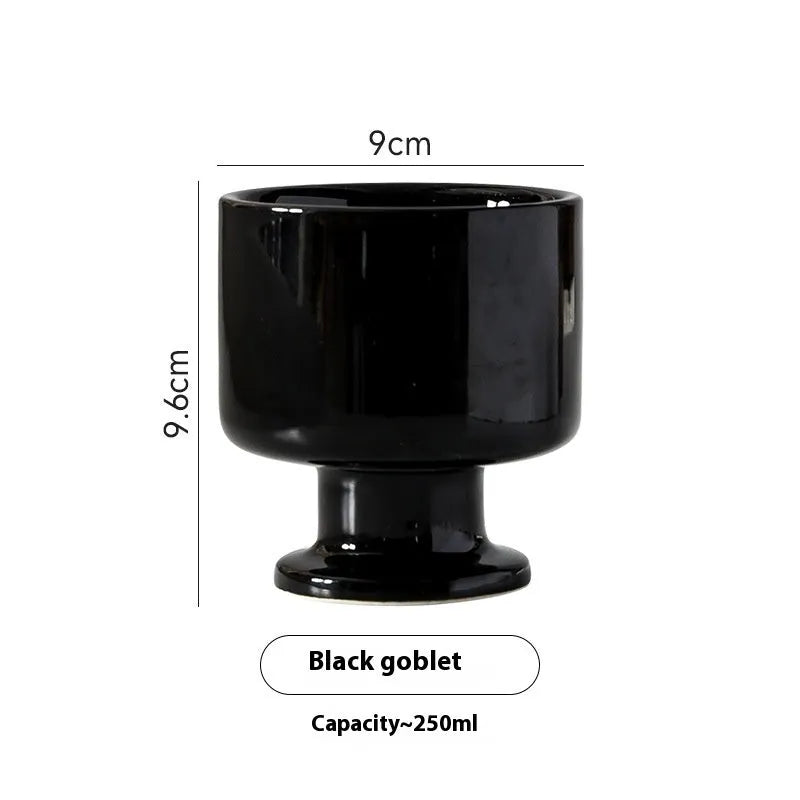 Hand-pinched irregular ceramic mug in solid colour, approximately 250ml capacity