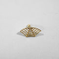 Geometric spider web stud earrings with electroplated gold and silver metallic finishes