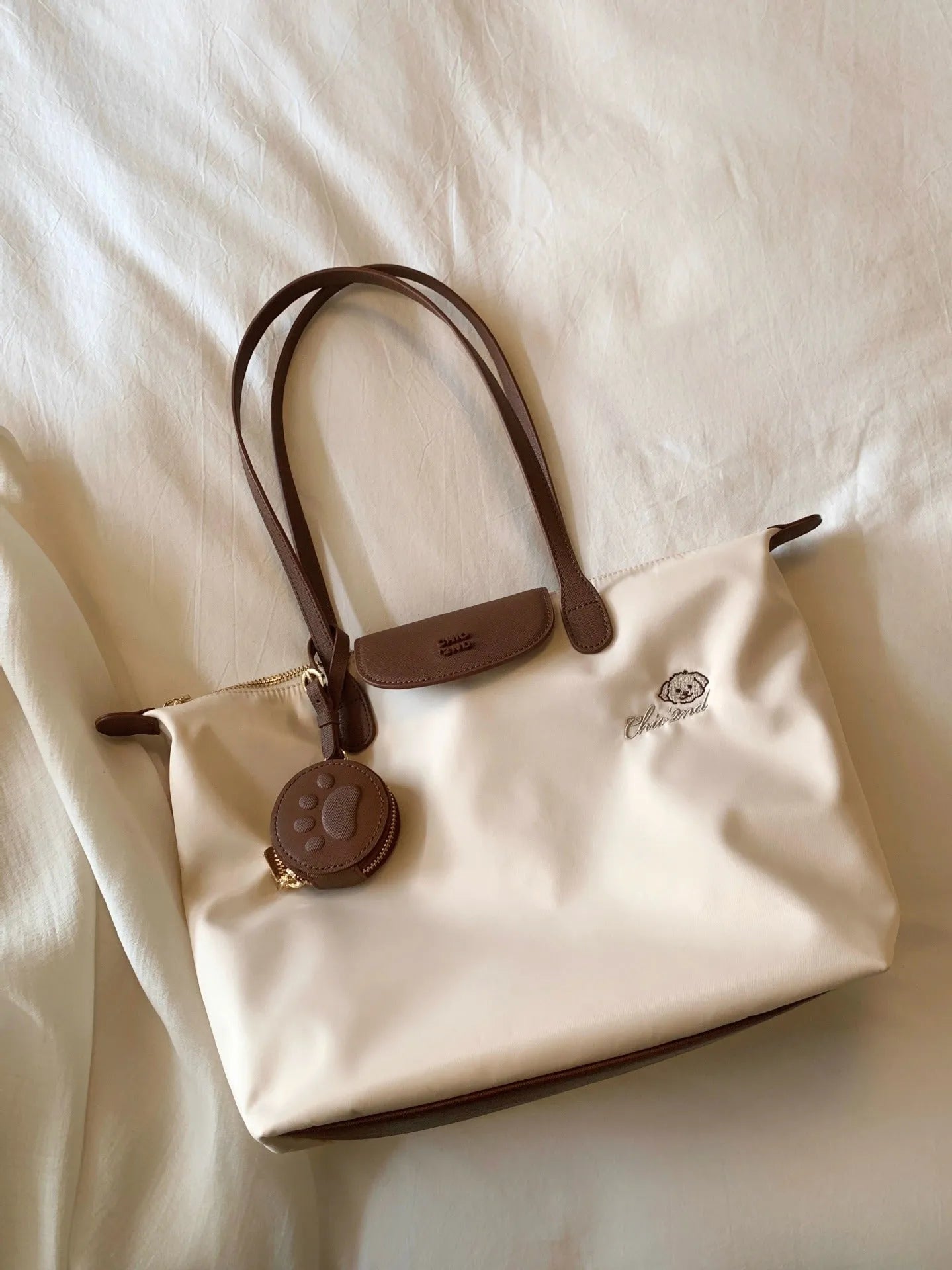 Oxford cloth tote shoulder bag in beige with sandwich pocket and internal phone storage