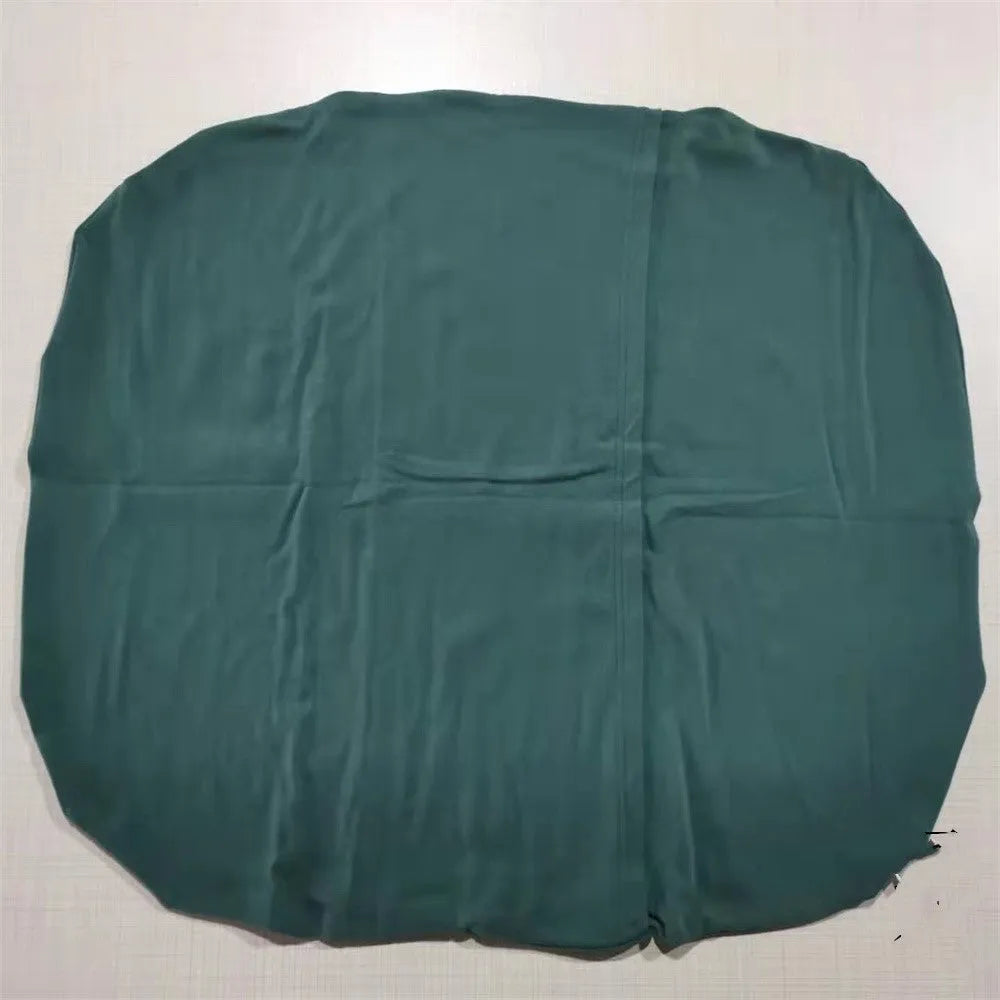 Beige portable baby nest crib for newborns measuring 75cm by 45cm on a neutral background.