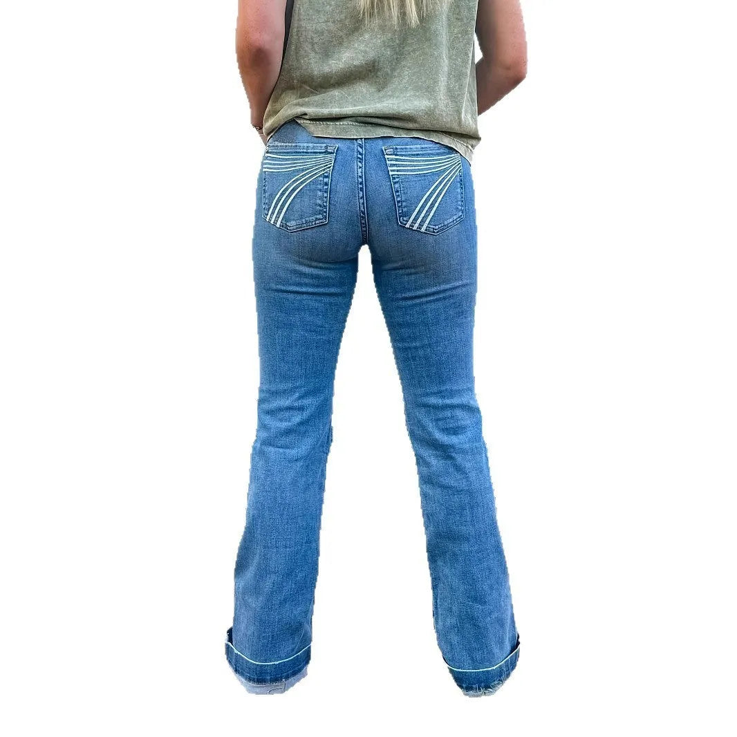 Blue embroidered women's slim-fit jeans with a slight flare and mid-rise waist.