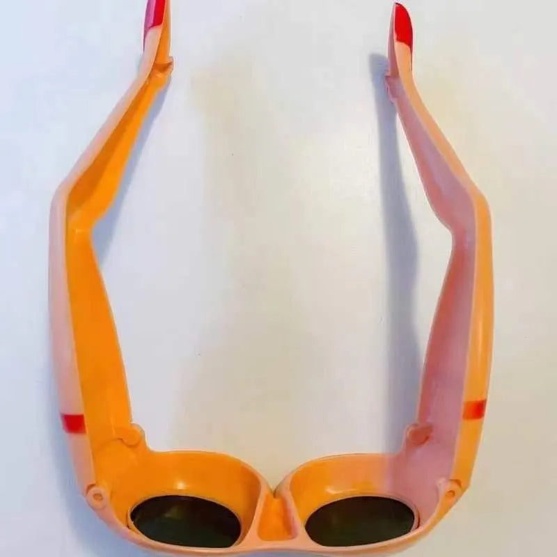 Orange Novel Personality Leg Hip Sunglasses, a plastic fashion accessory for sun protection and parties.