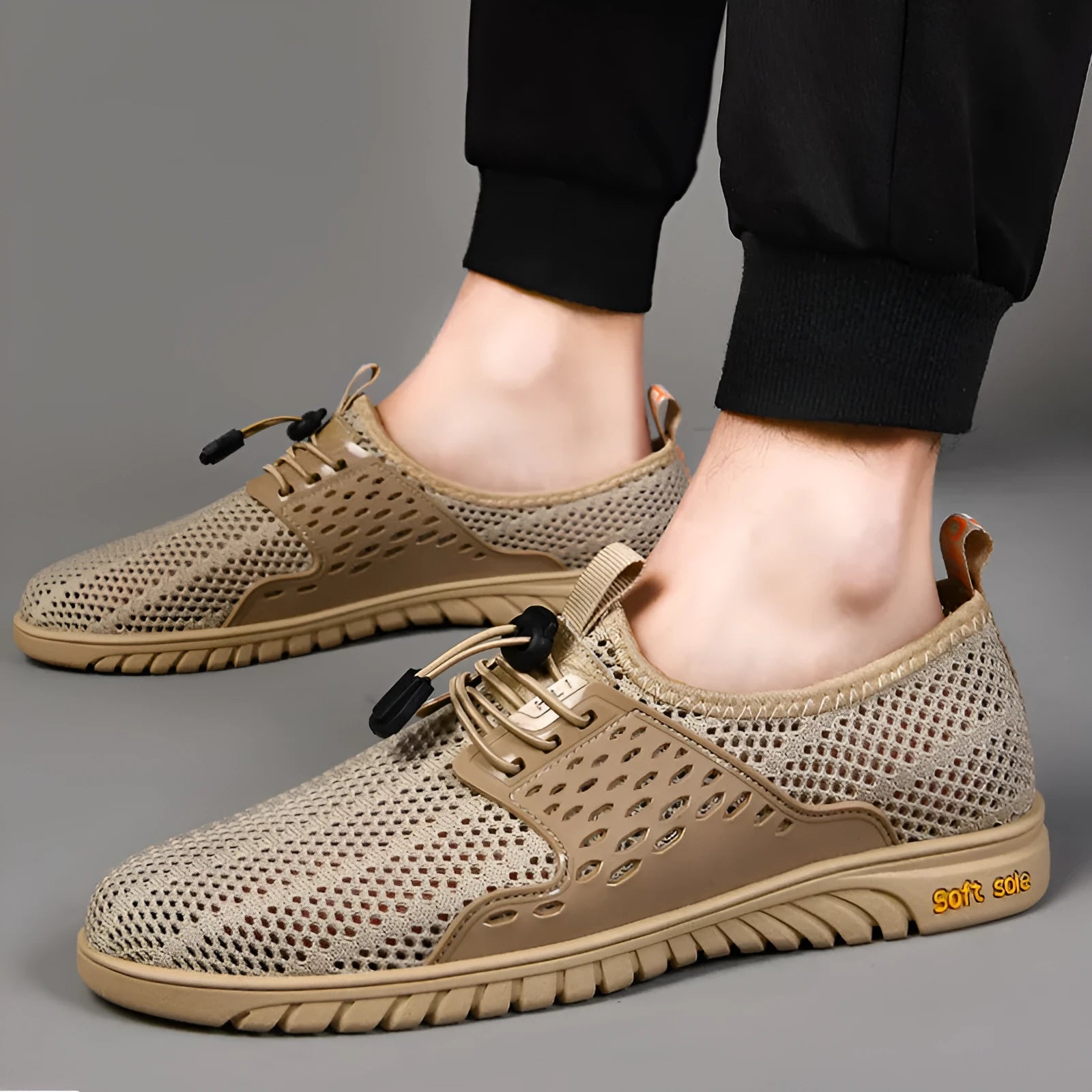 Men's breathable casual shoes in sand colour with mesh upper and elastic band.