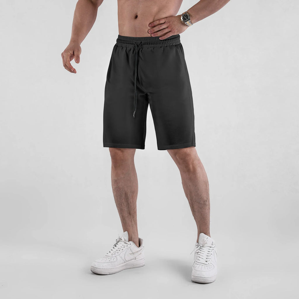 Men's black quick-drying mesh fitness shorts with elastic waistband