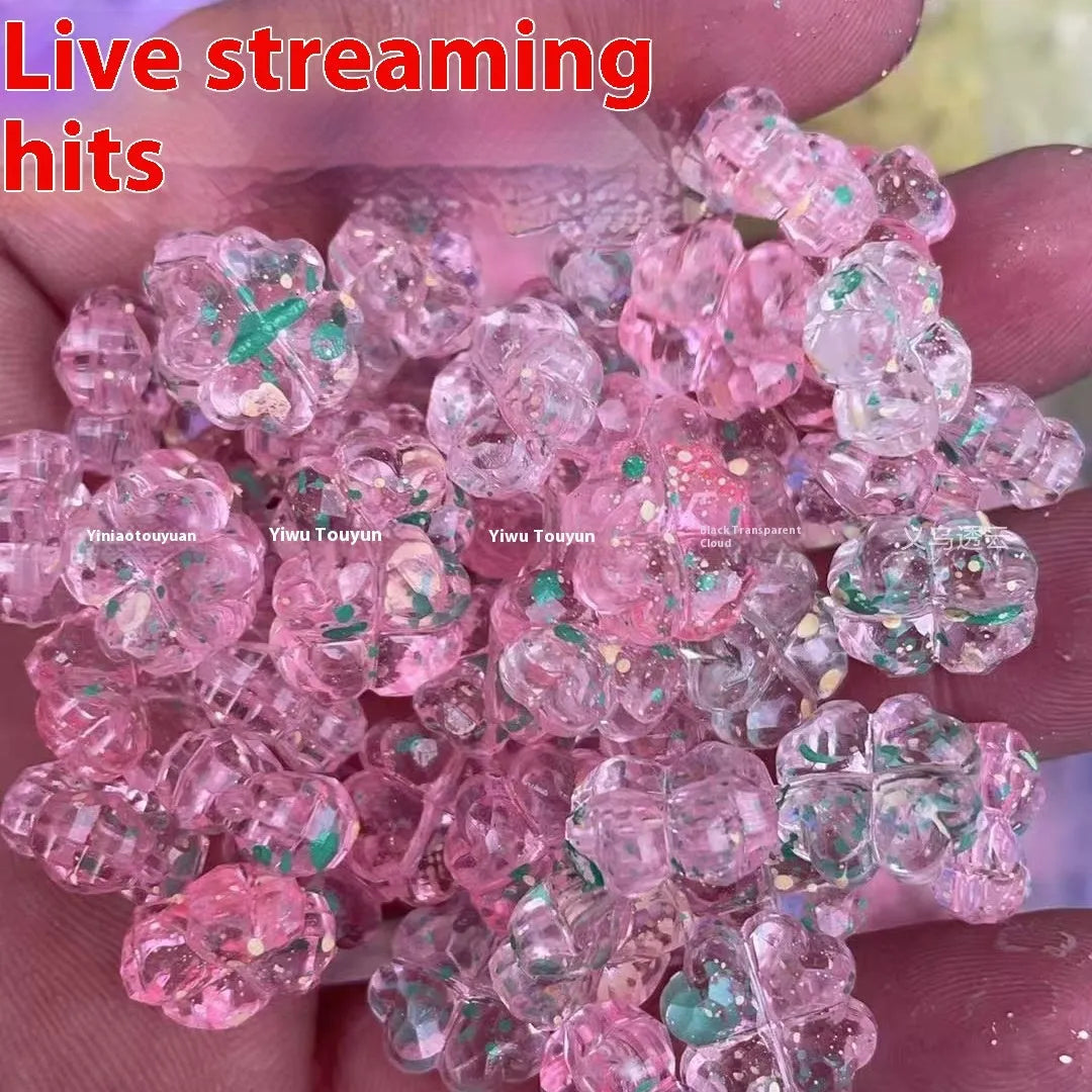 High transparency acrylic fat clover camellia beads scattered on white surface