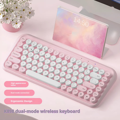 Pink portable Bluetooth keyboard with 84 keys and wireless connectivity