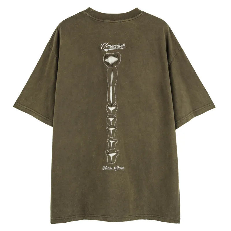 Loose fit black cotton t-shirt with a skull and printed letter design on the front.