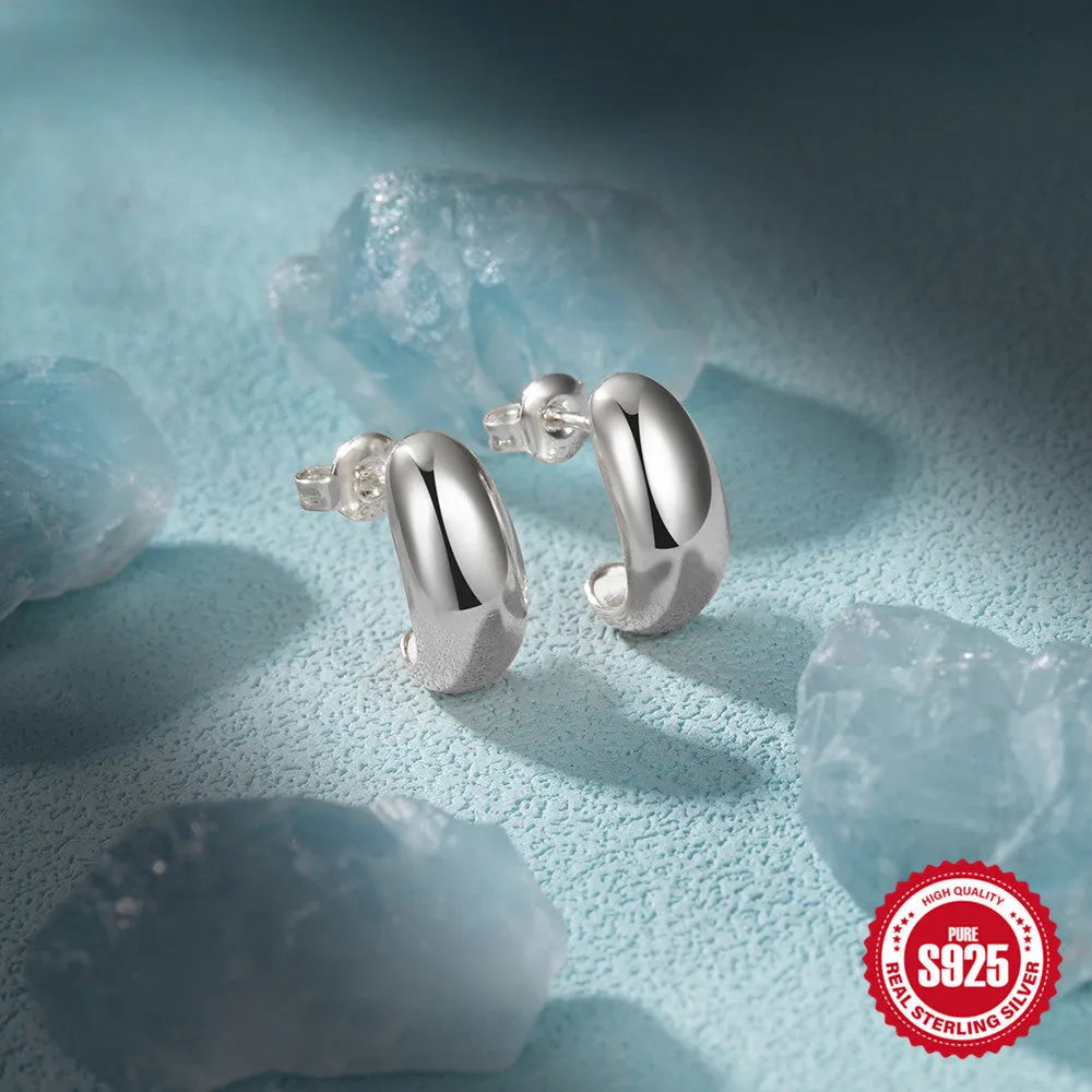 C-shaped 925 sterling silver ring stud earrings with glossy electroplated finish in gold or white gold colour options